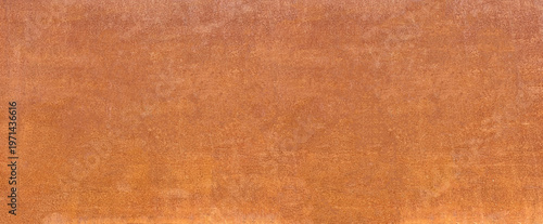 Rusty corroding metal surface creating weathered texture background