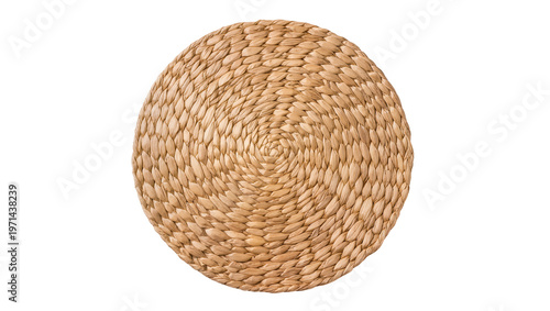 Round woven straw placemat with intricate spiral pattern, isolated on transparent background
