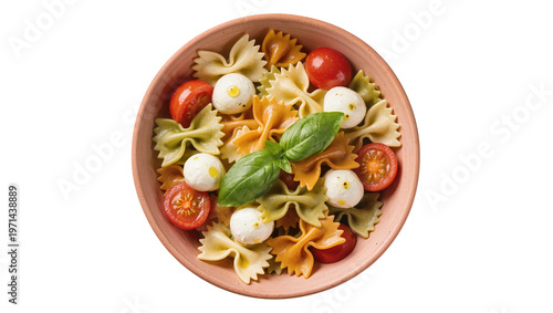 Canvastavla Farfalle pasta salad with cherry tomatoes mozzarella balls and basil, isolated o