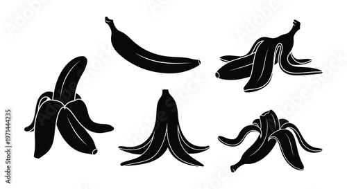 Collection of black silhouette banana peels arranged in various positions