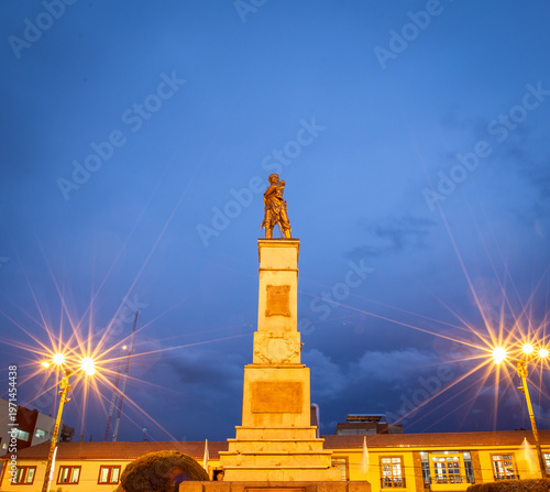 statue at night in Puno