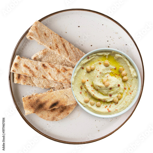 Tableau sur toile Creamy Classic Hummus with Toasted Whole Wheat Pita Strips on white plate for a