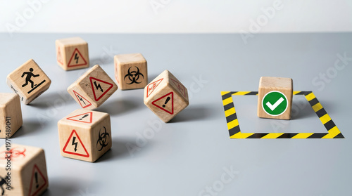Wallpaper Mural Safety wooden cube with green checkmark symbol stands secure in boundary tape while hazard rolling risk block tumbles away representing confident management and workplace hazard protection Torontodigital.ca