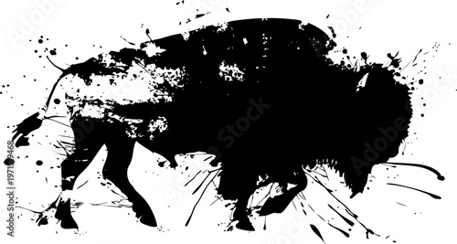 Black ink splatter silhouette of a running bison with abstract paint blotches and splashes