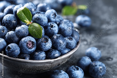 Riper blue berries inside a white bowl