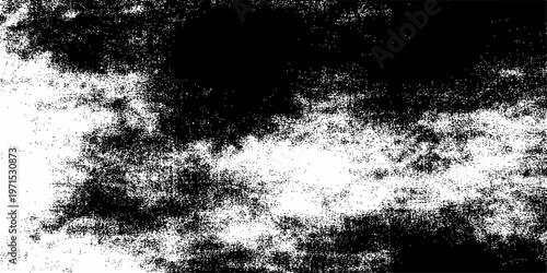 An abstract black ink splat creates a grungy vintage design with paint spray on a dirty textured paper background featuring a black and white art frame