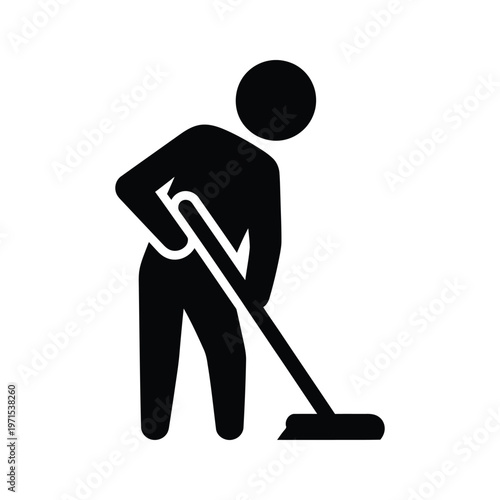 Person using a vacuum cleaner to clean the floor indoors