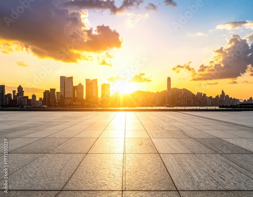 Stunning Sunset Over City Skyline with Warm Colors and Reflection