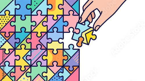 Hand placing puzzle piece in puzzle.