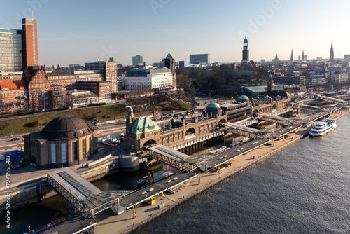 Aerial drone photo of the pier at St. Pauli Landungsbrücken in Hamburg at sunrise