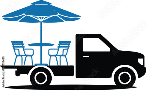 Flatbed truck with patio table and chairs under umbrella  outdoor furniture delivery