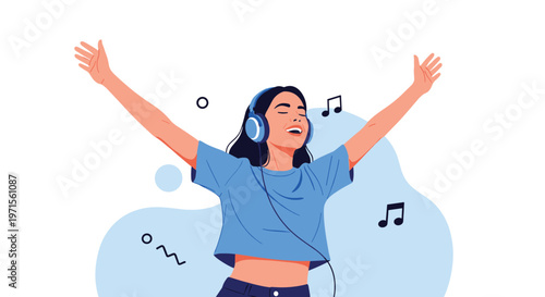 Energetic young woman wearing headphones and dancing joyfully with her arms raised while listening to favorite music.