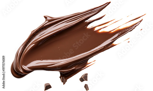 Molten chocolate splatters with fragmented chocolate pieces and glossy sheen.