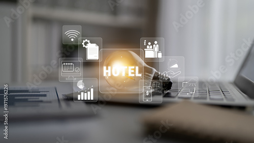 Foto Conceptual image of hotel management with light bulb and digital icons representing technology, services, and innovations in the hospitality sector Quark