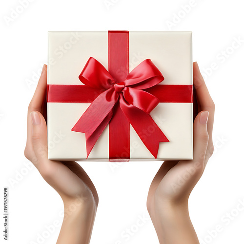 Hands holding white gift box with red ribbon bow isolated on transparent png background.