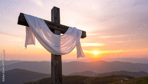 Wooden Christian Cross with White Cloth at Sunrise as Symbol of Resurrection