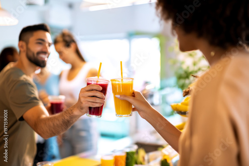 Happy customers savoring refreshing drinks at a lively juice bar