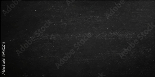A blank black surface texture. The background embodies minimalism and versatility, designed to serve as a versatile foundation for any creative endeavor.