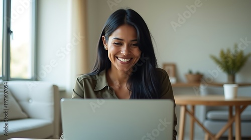 Happy Indian freelancer celebrating success with laptop, work from home concept