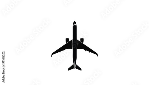 Black silhouette of an airplane flying high