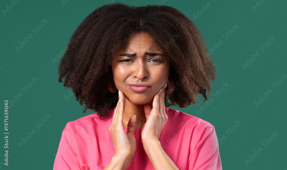 Fototapeta premium Young Teen Girl With Tooth Pain, green Background. Toothache, Dental Problem