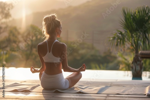“Peaceful morning yoga meditation outdoors, young woman in natural light, wellness and healthy lifestyle concept with copy space”