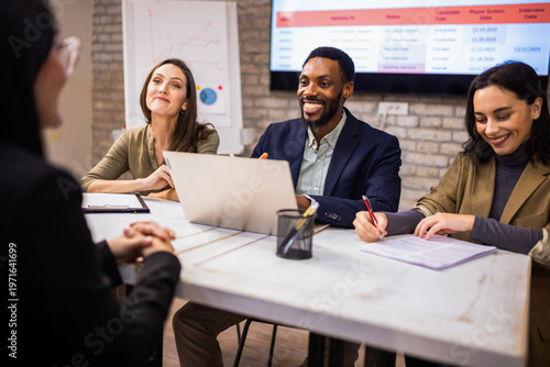 Tableau sur toile Professional hiring committee conducting a job interview in a modern corporate office