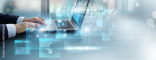 Canvas Print Businessman using laptop to analyze and control customer support data