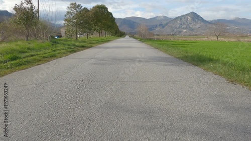 POV driving shot on a rural road through Rocchetta a Volturno plain, Italy.