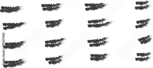 Collection of various black smudge or smear marks on white background for design or artistic use