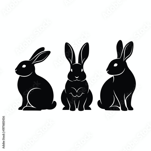 Three black silhouette rabbits a minimalist wildlife illustration