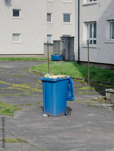 Wheelie bin left out for refuge collection in council estate