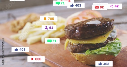 Showing double cheeseburger sitting on wood board, with fries and social badges, copy space