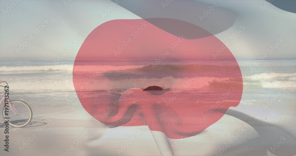 Fototapeta premium Floating translucent red overlay softening sandy shore, calm surf, small dark rock, pale pink bike