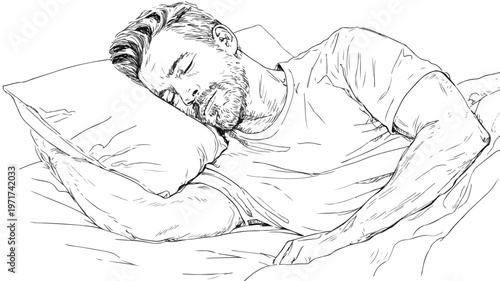 Handsome Man Relaxing Comfortably in Bed at Home