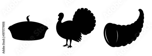 Black silhouettes of a turkey, pumpkin pie and a cornucopia for thanksgiving