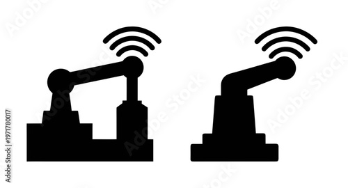 Two robotic arms with wireless signals on for industrial automation and technology