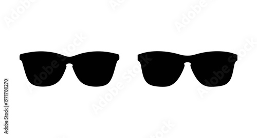 Two pairs of sunglasses on a for fashion or accessory concepts