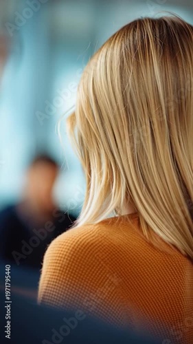 Woman with blonde hair profile.