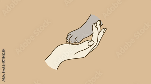 Hand holding small animal paw.