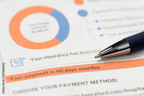 Canvas Print Medical billing statement showing a past due amount, with a pen placed on top