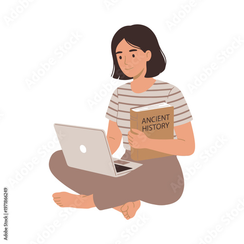Woman with laptop and book sitting cross legged