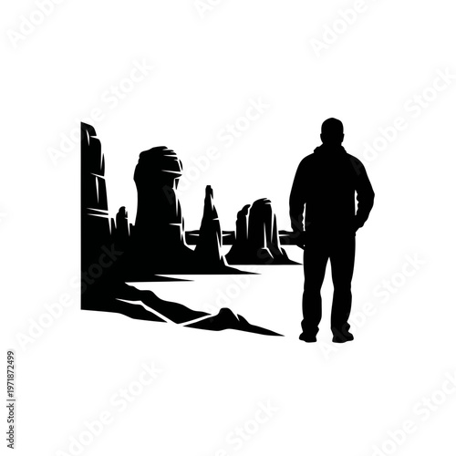 Contemplative Journey in Desert: A solitary figure stands in silhouette, gazing upon the dramatic desert landscape.