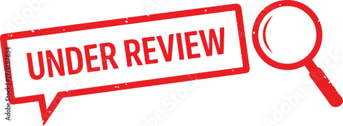 Red speech bubble with text U N D E R E V I E W and magnifying glass under