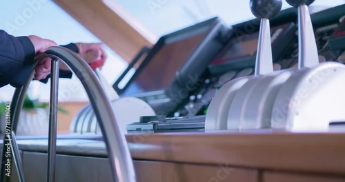 Technician Adjusting Controls in Yacht Engine Room