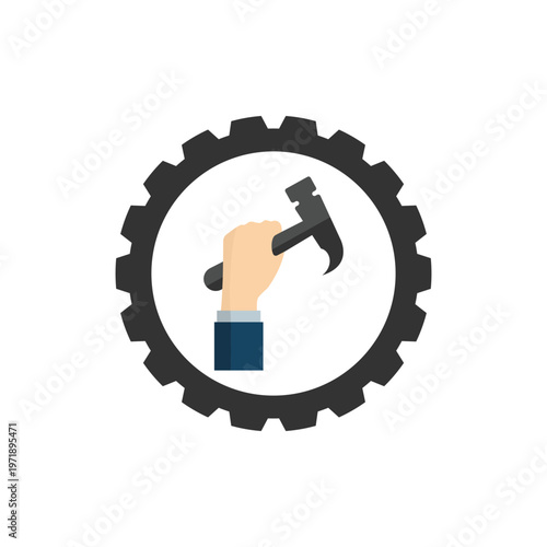 Hand holding a hammer and gear