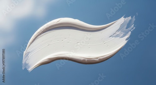 White Cream Smear on Blue Background.
