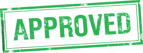 A green rectangular stamp displaying the word approved in bold lettering