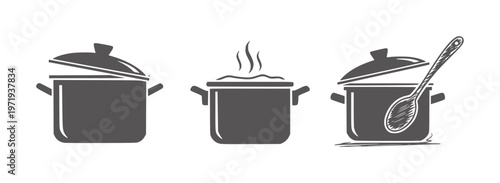 Three dark gray cooking pots one steaming one with a spoon kitchen food
