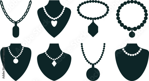 Collection of necklaces displayed on jewelry busts on white background.